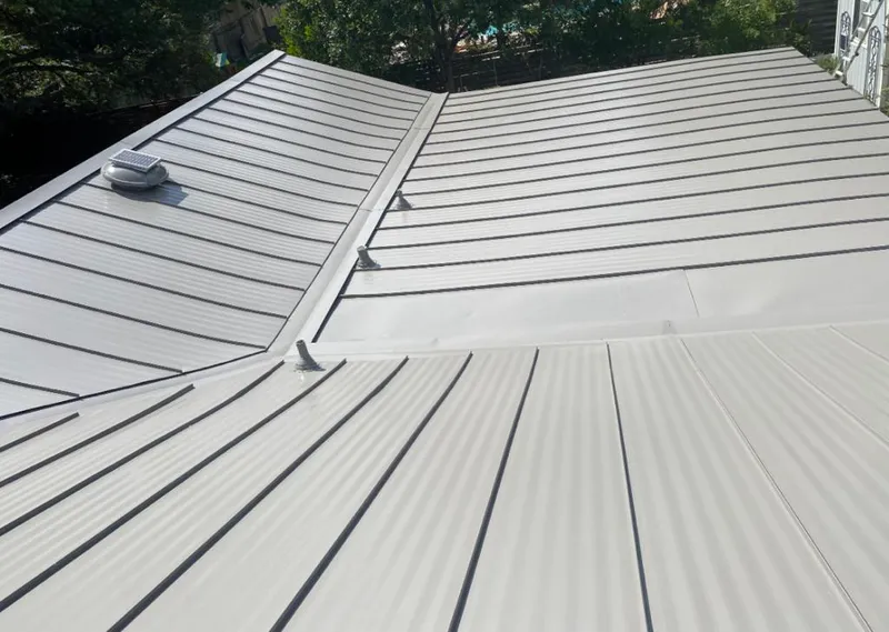 Solar attic fan installed on a metal roof for Roof Ventilation in Gettysburg